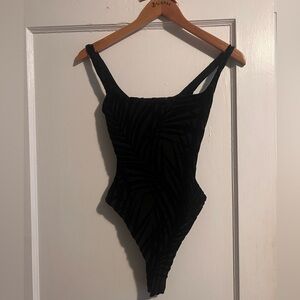 NWT Black bodysuit from Naked Wardrobe, LA. This style is currently SOLD OUT.